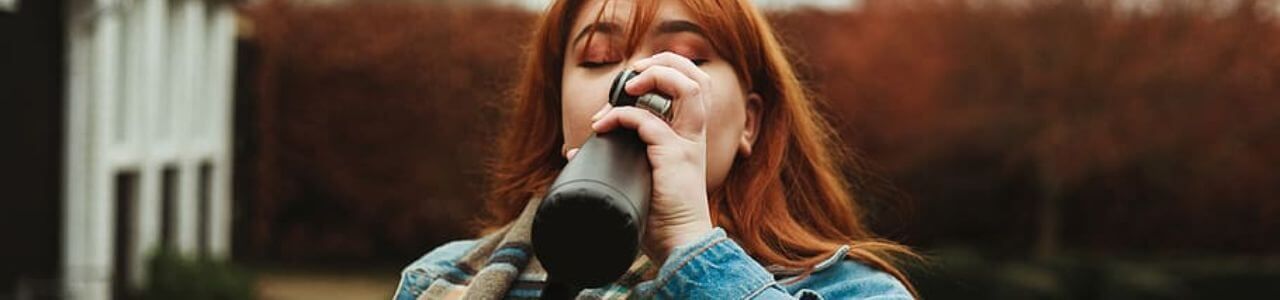 Drinking From Tumbler