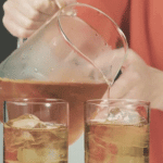 Glass Tea Pitcher Pouring Tea