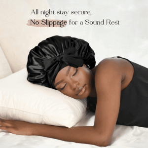 Person sleeping while wearing a YANIBEST Satin Bonnet