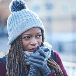 Girl wearing extreme cold weather gloves