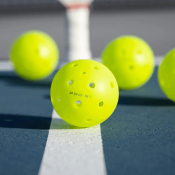 A yellow pickleball