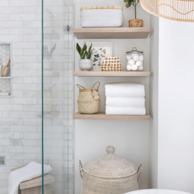 Floating wood shelves installed in the bathroom