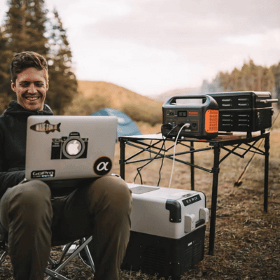 Portable power station powering a laptop