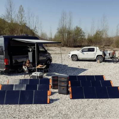 Camper using a solar-powered RV generator