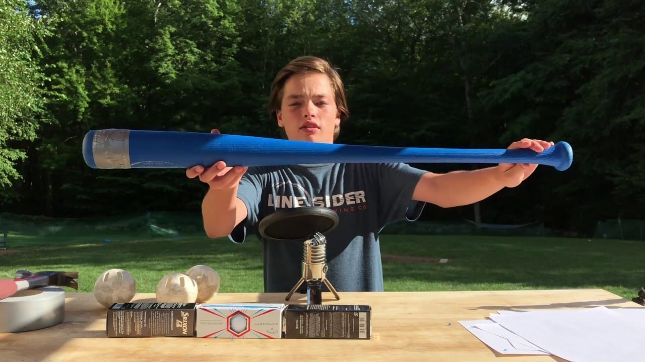 Boy presenting his corked wiffle ball bat
