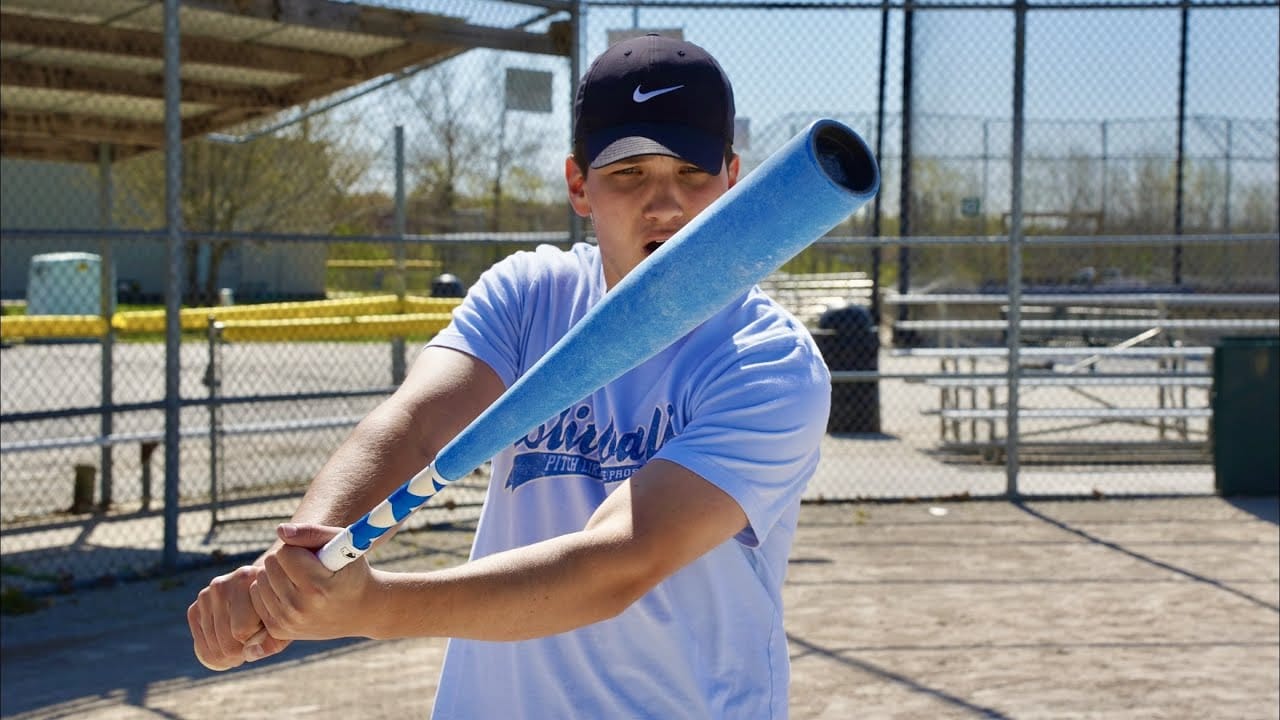 Boy swinging his corked wiffle ball bat