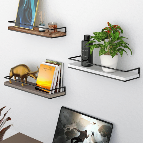 Floating shelves held by designer brackets on a wall