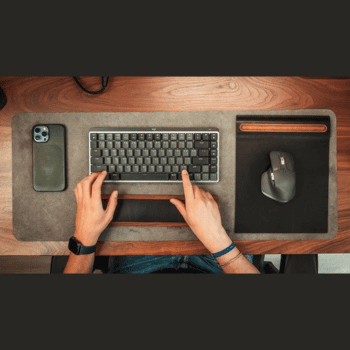 Keyboard, mouse and wrist support on a home office desk