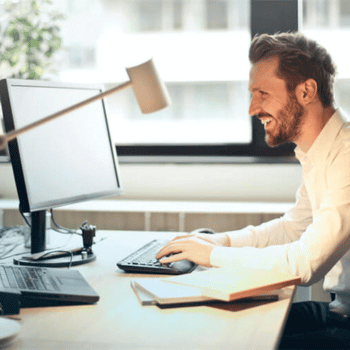 Man at his computer with good lighting