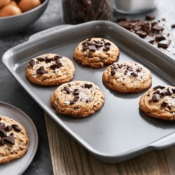 Baked cookies on a ceramic cookie sheet