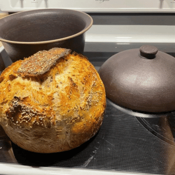Baked bread out of a ceramic pot