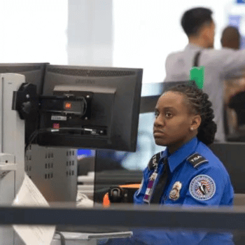 Baggage monitor watched by a TSA agent