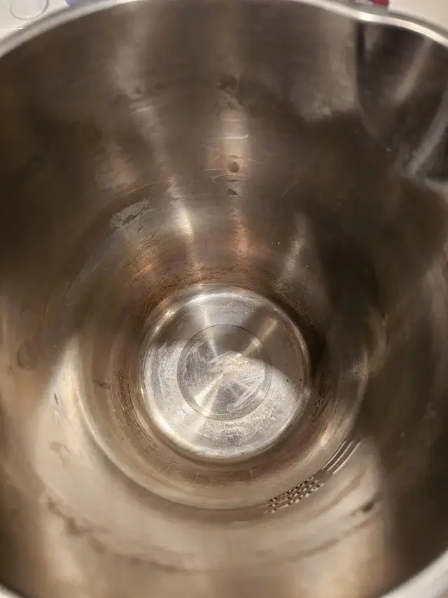 Tarnished stainless steel bowl