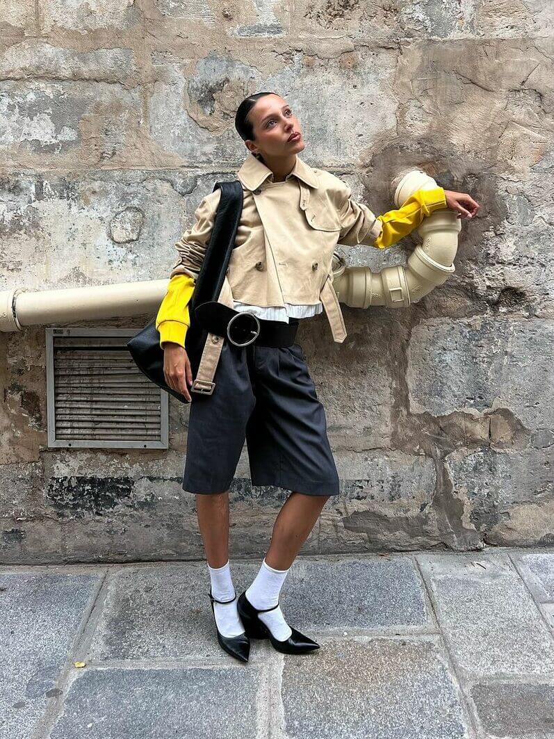 A woman showing style in jorts