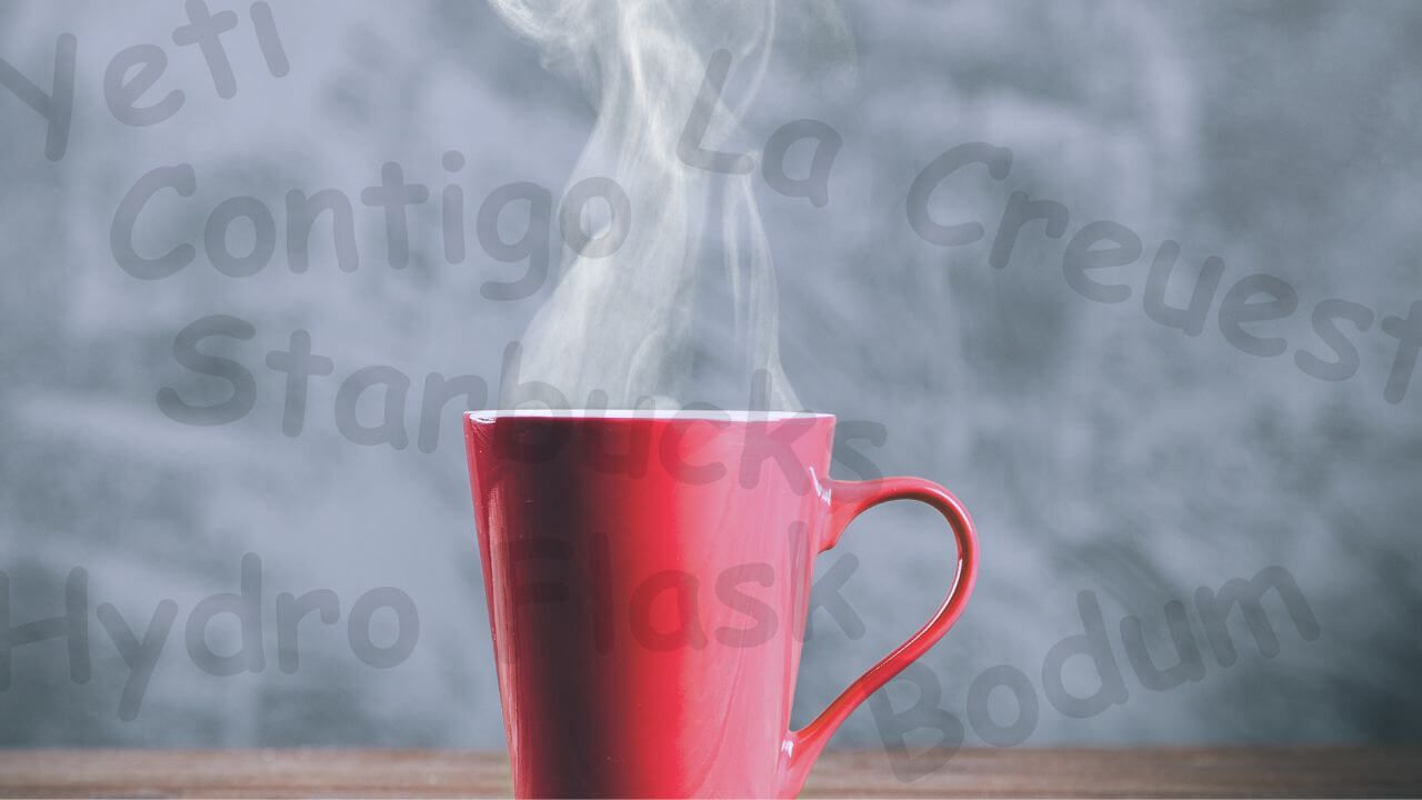 A coffee mug with hot coffee and company brand names in the background