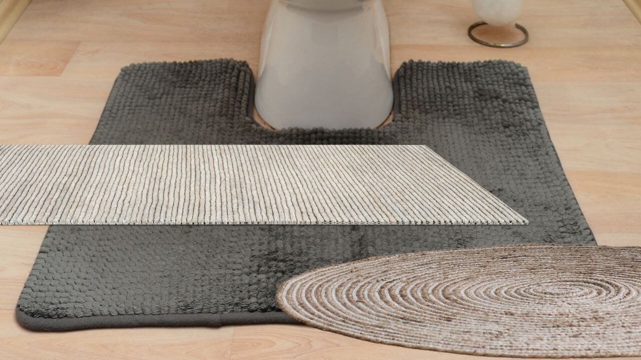 Three types of rugs in front of a toilet