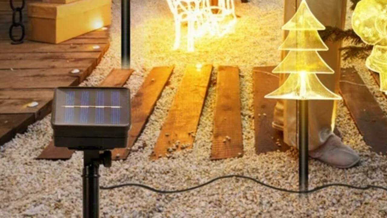 Solar panel connected to outdoor Christmas decorations