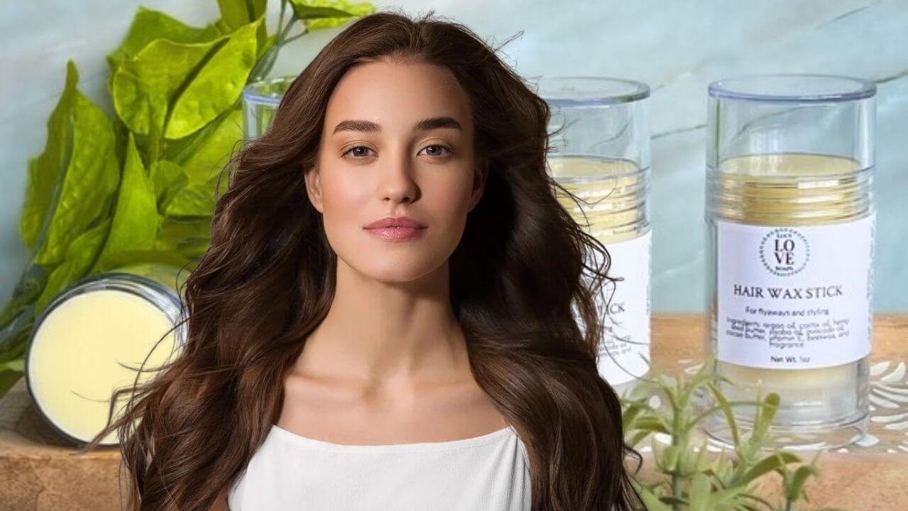 Woman showing her beautiful hair following use of a hair wax stick