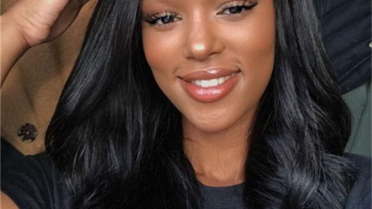 Person with straight hair promoting silk bonnets