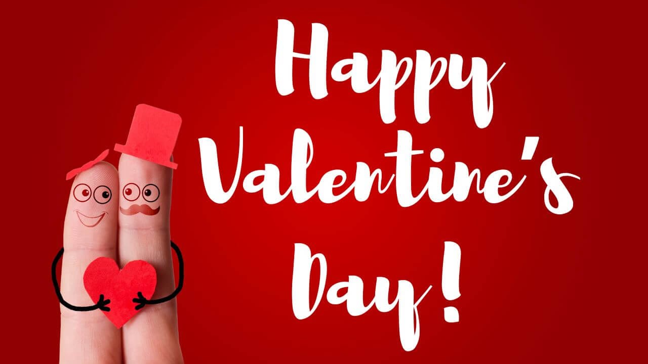 A man and woman together expressing Happy Valentine's Day!