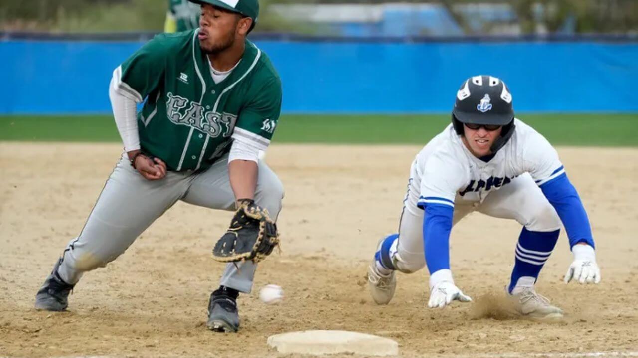 Baseball player with a first base glove in a game situation