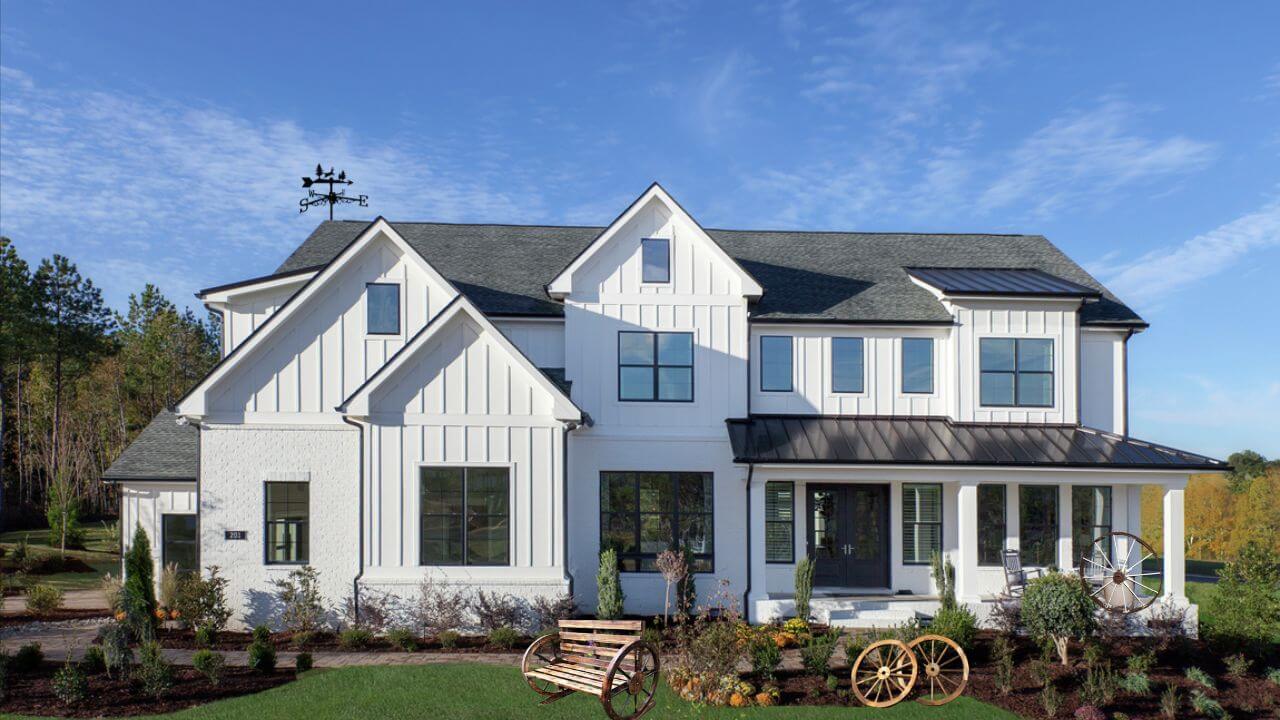Farmhouse-style exterior home with farmhouse-style adornments