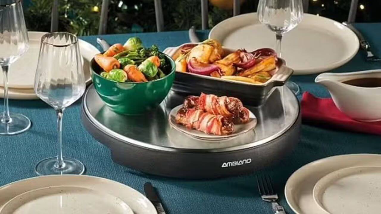 Dinner table with a warming tray warming three different dishes