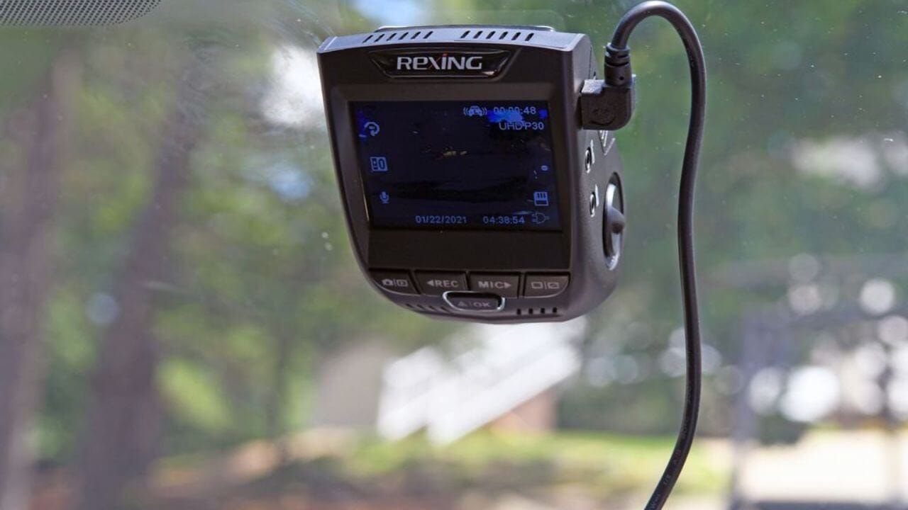 Dash cam on the inside of the vehicle front window