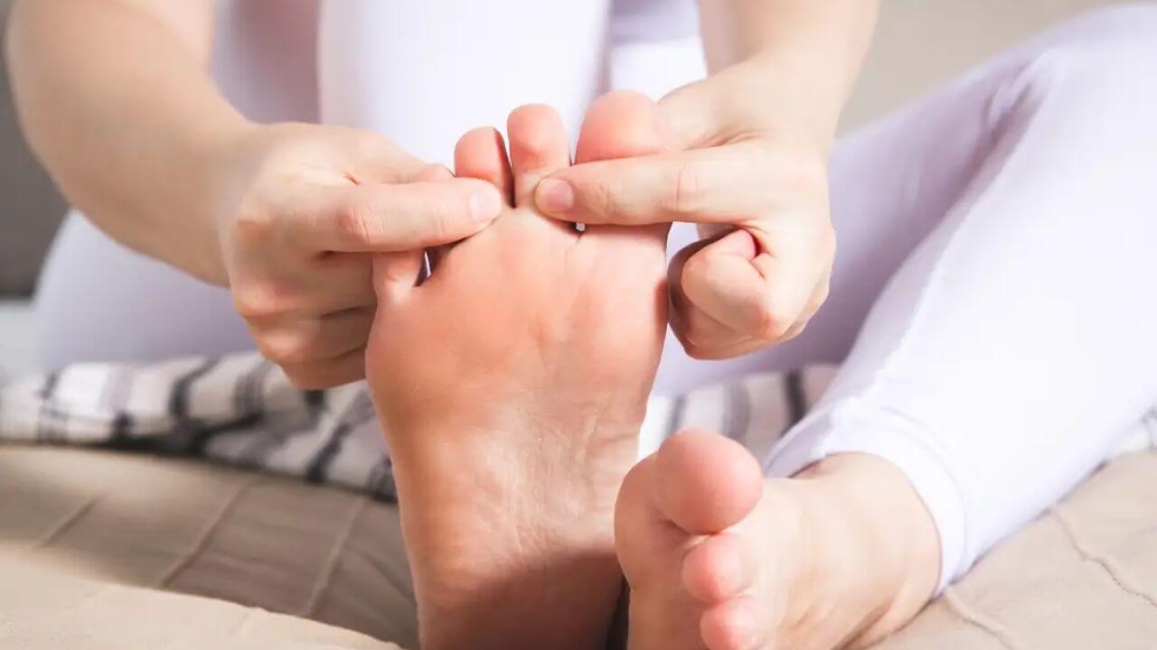 A women's bare foot during barefoot shoe transition